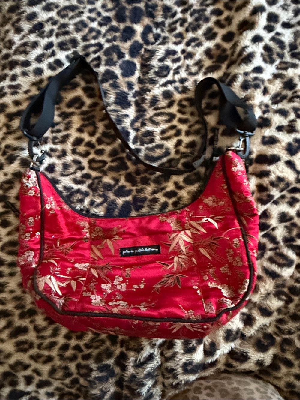 Petunia Pickle Bottom Sunset Dragon Roll diaper bag